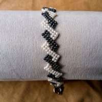 BRACCIALE CON PERLE E EMATITE