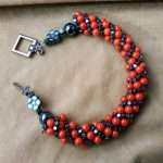 BRACCIALE CON CORALLO ROSSO E EMATITE