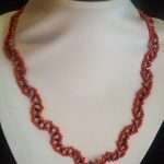 COLLANA CON CORALLO E EMATITE