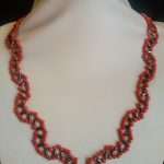 COLLANA CON CORALLO E EMATITE