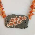 COLLANA IN PIETRA LAVICA E CORNIOLA